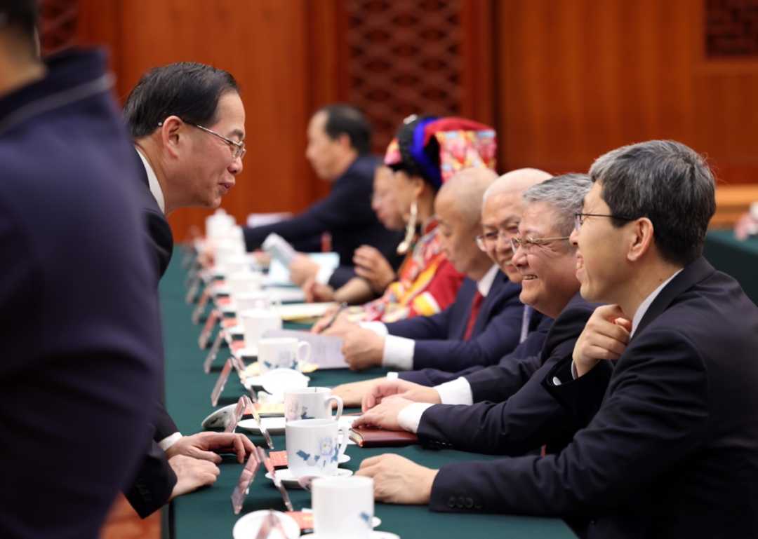 两会影像|代表委员“微表情” 两会影像|代表委员“微表情”